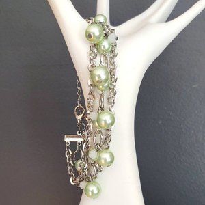 Silver multi strand bracelet w/green & white beads